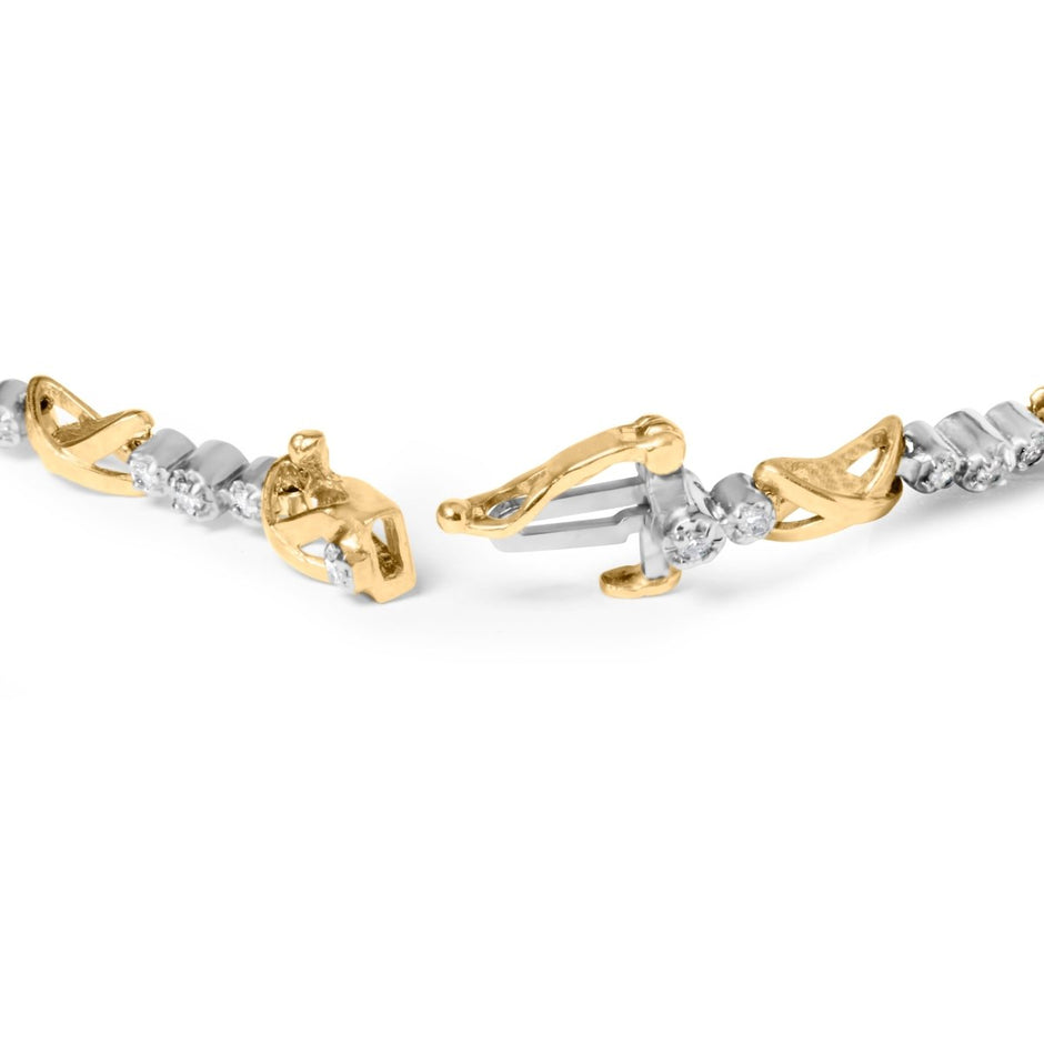 10K Two-Tone Gold 1/2 Cttw Diamond Alternating 3 Stone and X-Link 7
