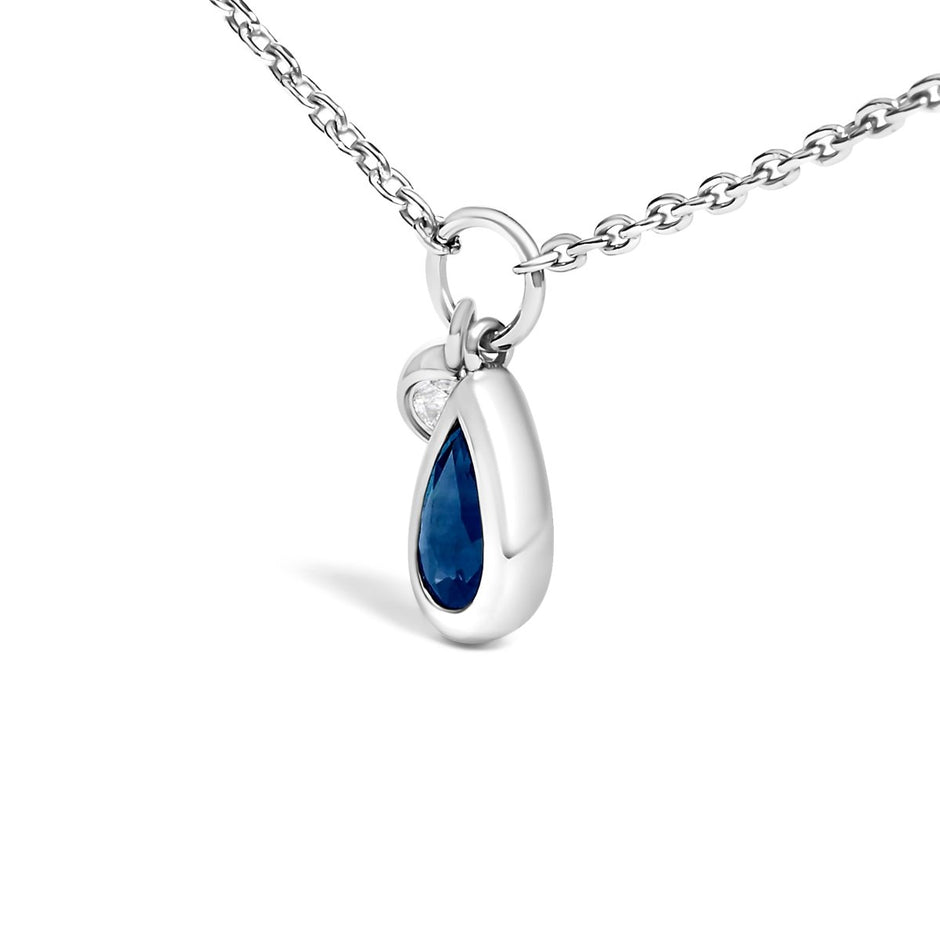 10K White Gold 6x4 mm Pear Blue Sapphire and Diamond Accent Charm Pendant Necklace - 18