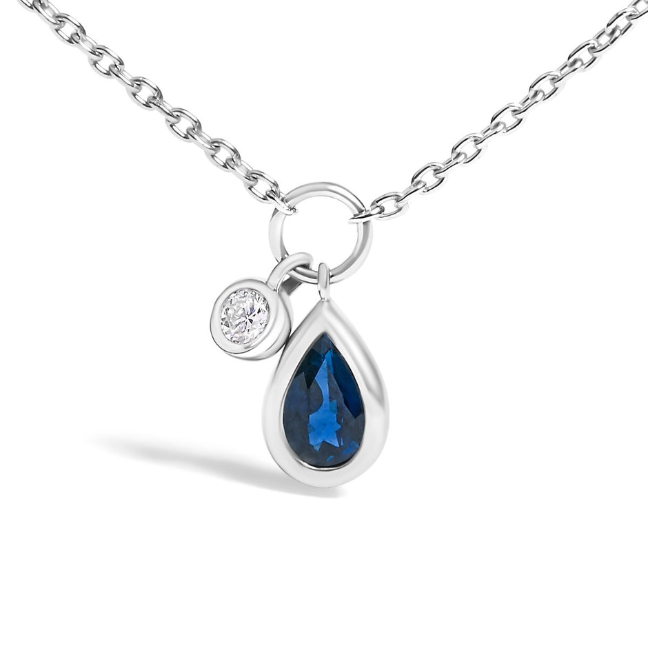 10K White Gold 6x4 mm Pear Blue Sapphire and Diamond Accent Charm Pendant Necklace - 18