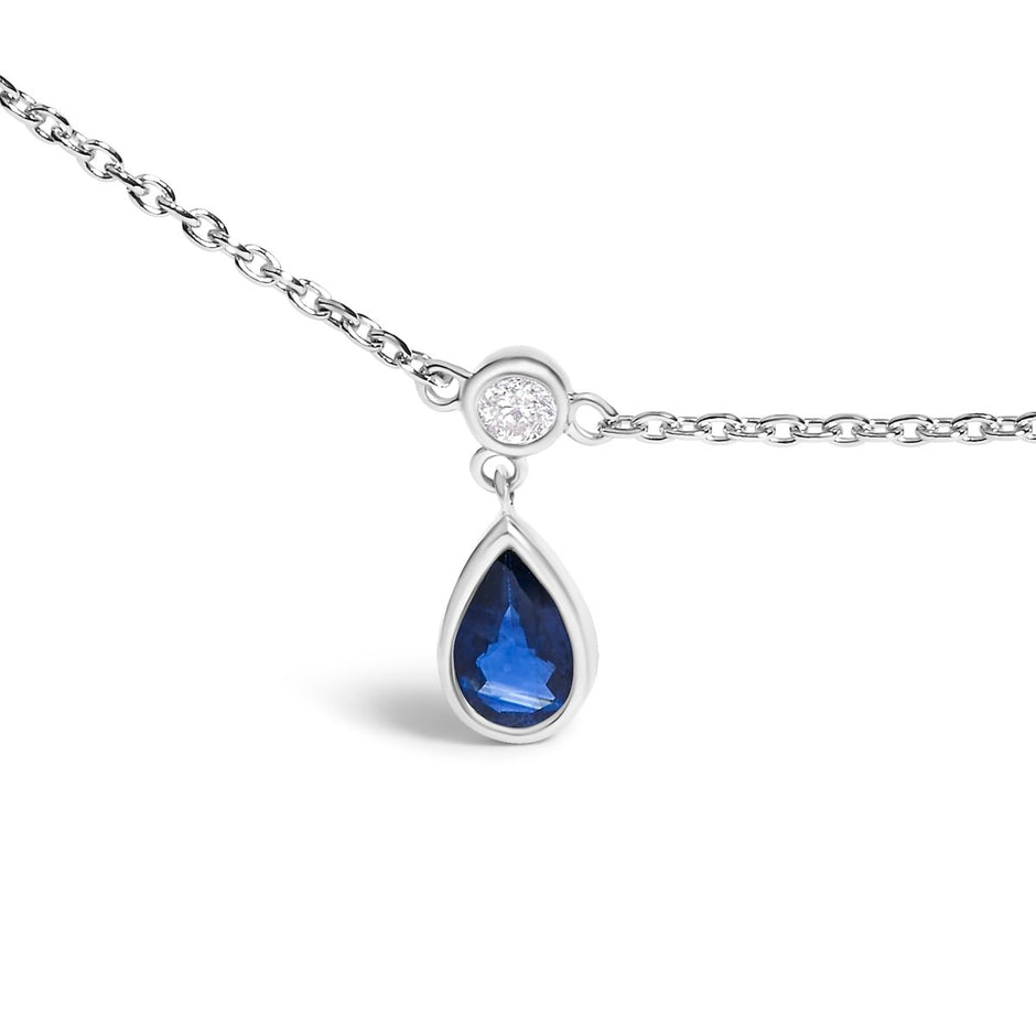 10K White Gold Dangling 5x3 mm Pear Blue Sapphire and Diamond Station Necklace - 18