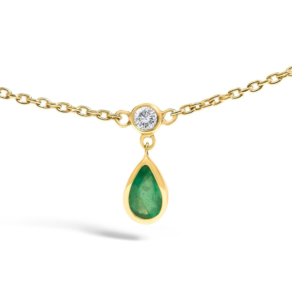 10K Yellow Gold Dangling 5x3 mm Green Emerald and Diamond Station Necklace - 18