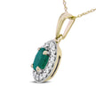 14K Yellow Gold 6x4mm Emerald and 1/5 Cttw Round Diamond Halo Pendant 18