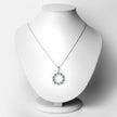 1.10 Carat Genuine Emerald and White Topaz .925 Sterling Silver Pendant