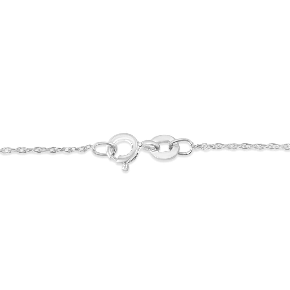 .925 Sterling Silver 1/6 Cttw Brilliant-Cut Diamond Miracle-Set Shared Prong Cross 18