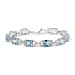 .925 Sterling Silver 7x7 mm Cushion Cut Blue Topaz and 1/20 cttw Round Cut Diamond Fashion Tennis Bracelet (I-J Color, I1-I2 Clarity) - 7