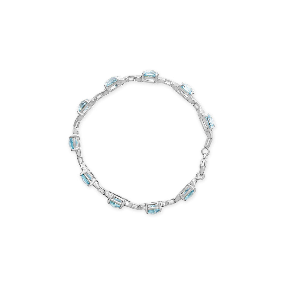 .925 Sterling Silver 7x7 mm Cushion Cut Blue Topaz and 1/20 cttw Round Cut Diamond Fashion Tennis Bracelet (I-J Color, I1-I2 Clarity) - 7