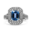 .925 Sterling Silver Diamond Accent and 8X6 mm Emerald-Shape Blue Topaz Ring (I-J Color, I2-I3 Clarity) - Ring Size 7