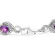 .925 Sterling Silver 1/10 Cttw Natural Round Diamond and 7X5MM Oval Amethyst Cross Tennis Bracelet (I-J Color, I1-I2 Clarity) - 7