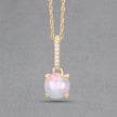 0.53 Carat Genuine Ethiopian Opal and White Diamond 10K Yellow Gold Pendant