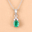 0.64 Carat Genuine Zambian Emerald and White Diamond 10K White Gold Pendant